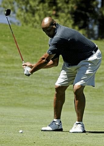 Charles Barkley playing golf